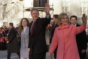 The President, First Lady, and Chelsea on parade down Pennsylvannia Avenue on Inauguration day.